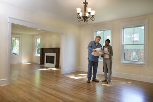 A homebuyer and home inspector complete a final walk through